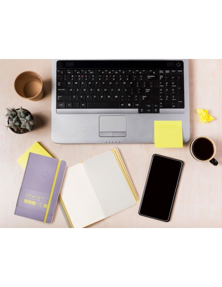 Cuaderno con gomilla antartik notes tapa blanda a6 hojas lisas morado y amarillo 100 hojas 80 gr fsc