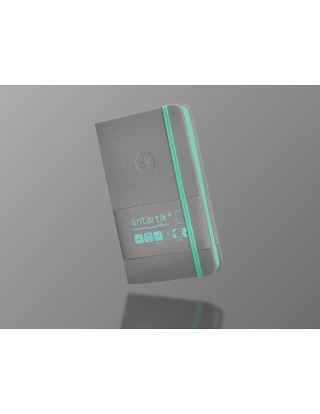 Cuaderno con gomilla antartik notes tapa dura a6 hojas lisas gris y turquesa 100 hojas 80 gr fsc