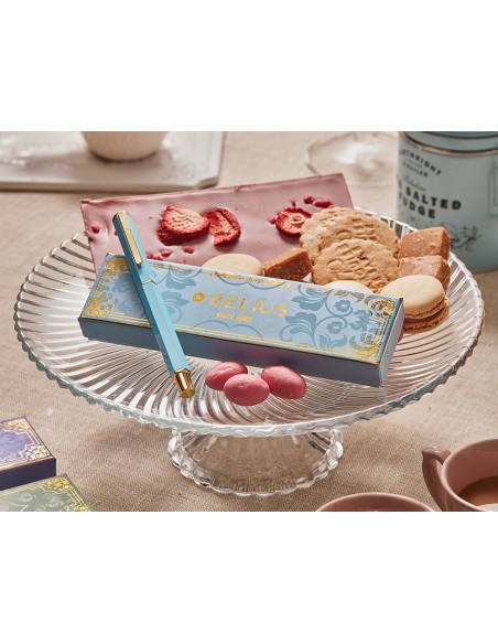 Boligrafo belius macaron bliss forma hexagonal color celeste y dorado tinta azul caja de diseño