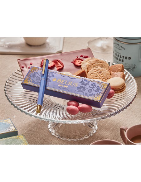 Boligrafo belius macaron bliss forma hexagonal color morado y dorado tinta azul caja de diseño